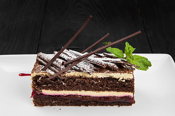 Image showing Plate with piece of delicious chocolate cake