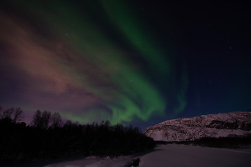 Image showing Aurora Borealis, River Eibyelva, Alta, Norway