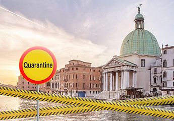 Image showing Crossing police lines with alarm sign of quarantine on the background of Church Piccolo in Rome City, Italy.