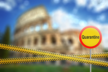 Image showing Warning sign of quarantine on the blurred background of Colosseum in Rome City, Italy.