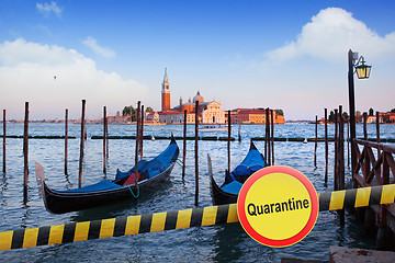 Image showing Prohibition yellow sign of quarantine on the background of San Giorgio Maggiore church in Venice, Italy.