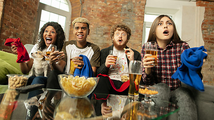 Image showing Excited group of people watching sport match, championship at home