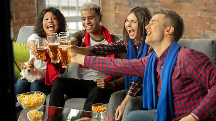 Image showing Excited group of people watching sport match, championship at home