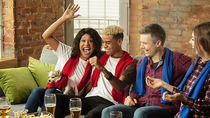 Image showing Excited group of people watching sport match, championship at home