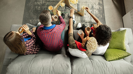 Image showing Excited group of people watching sport match, championship at home