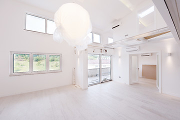 Image showing Interior of empty stylish modern open space two level apartment