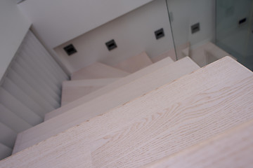 Image showing stylish interior with wooden stairs