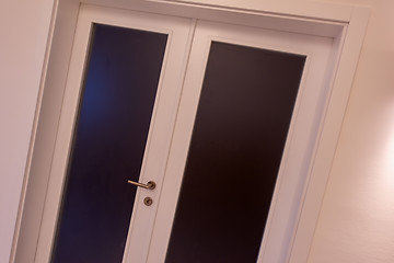 Image showing double glass door with white wooden frame