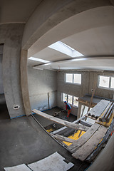 Image showing worker performing and polishing sand and cement screed floor