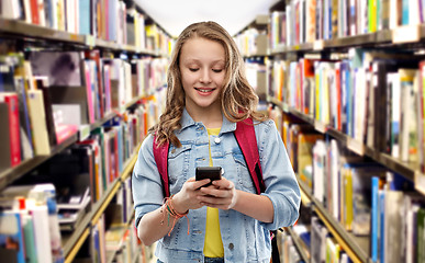 Image showing teen student girl with school bag and smartphone