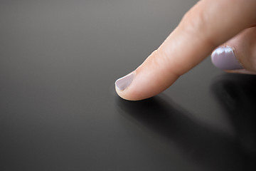 Image showing hand using black interactive panel