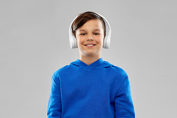 Image showing portrait of smiling boy in blue hoodie