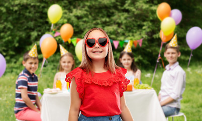 Image showing girl in heart shaped sunglasses at birthday party