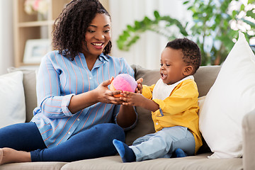 Image showing mother and baby playing with ball at home