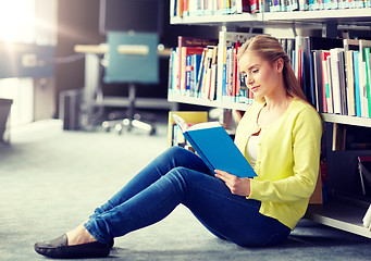 Image showing high school student girl reading book at library