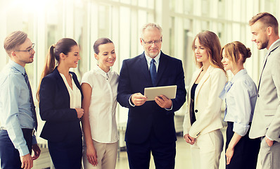 Image showing business people with tablet pc computer at office