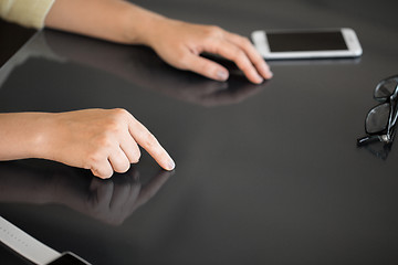 Image showing close up of woman using black interactive panel