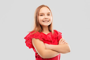 Image showing beautiful smiling girl with crossed arms