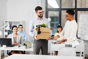 Image showing new male employee meeting colleagues at office