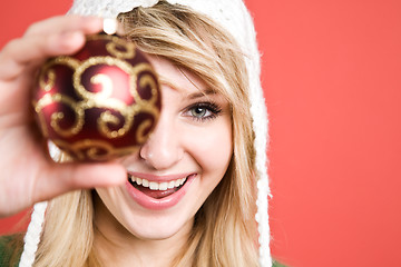 Image showing Caucasian girl with christmas ornament