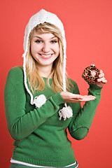 Image showing Caucasian girl with christmas ornament