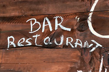 Image showing Restaurant bar sign painted on wooden board