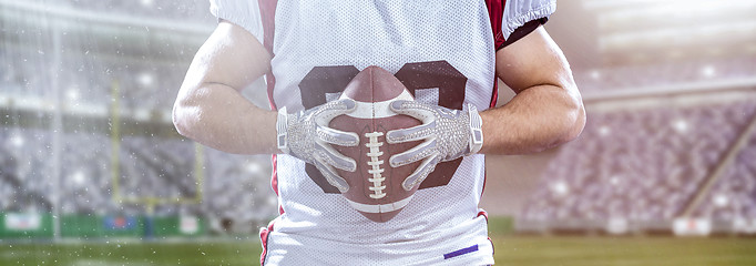 Image showing closeup American Football Player isolated on big modern stadium