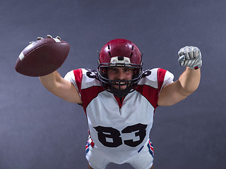 Image showing american football player celebrating touchdown