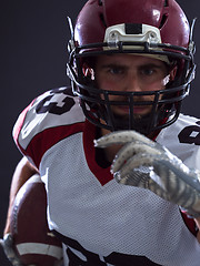 Image showing American football Player running with the ball