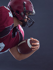 Image showing American football Player running with the ball