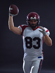 Image showing american football player throwing ball