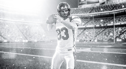 Image showing american football player throwing ball