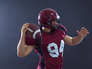 Image showing american football player throwing ball