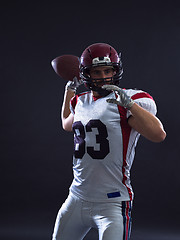 Image showing american football player throwing ball