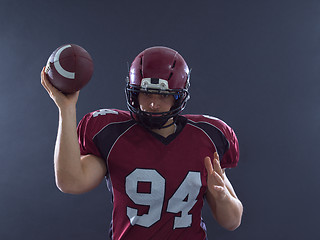 Image showing american football player throwing ball