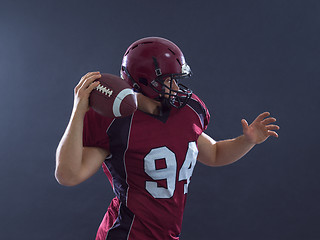 Image showing american football player throwing ball