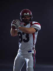 Image showing american football player throwing ball