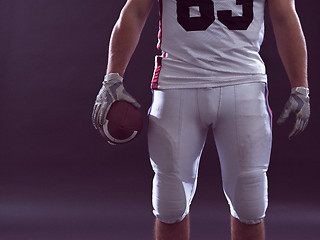 Image showing closeup American Football Player isolated on gray