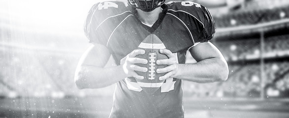 Image showing closeup American Football Player isolated on big modern stadium