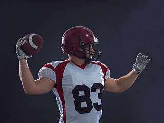 Image showing american football player throwing ball