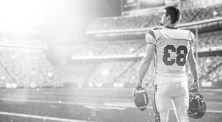 Image showing American Football Player isolated on big modern stadium field