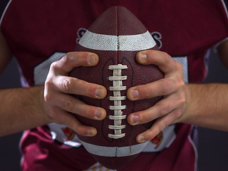 Image showing closeup American Football Player isolated on gray