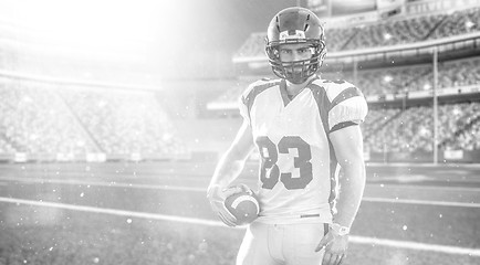 Image showing American Football Player isolated on big modern stadium field