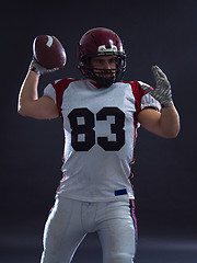 Image showing american football player throwing ball