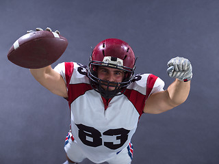 Image showing american football player celebrating touchdown