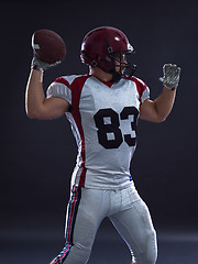 Image showing american football player throwing ball