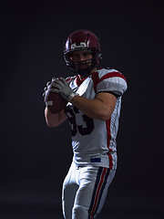 Image showing american football player throwing ball