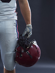 Image showing closeup American Football Player isolated on gray