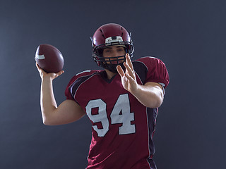 Image showing american football player throwing ball