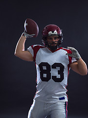 Image showing american football player throwing ball